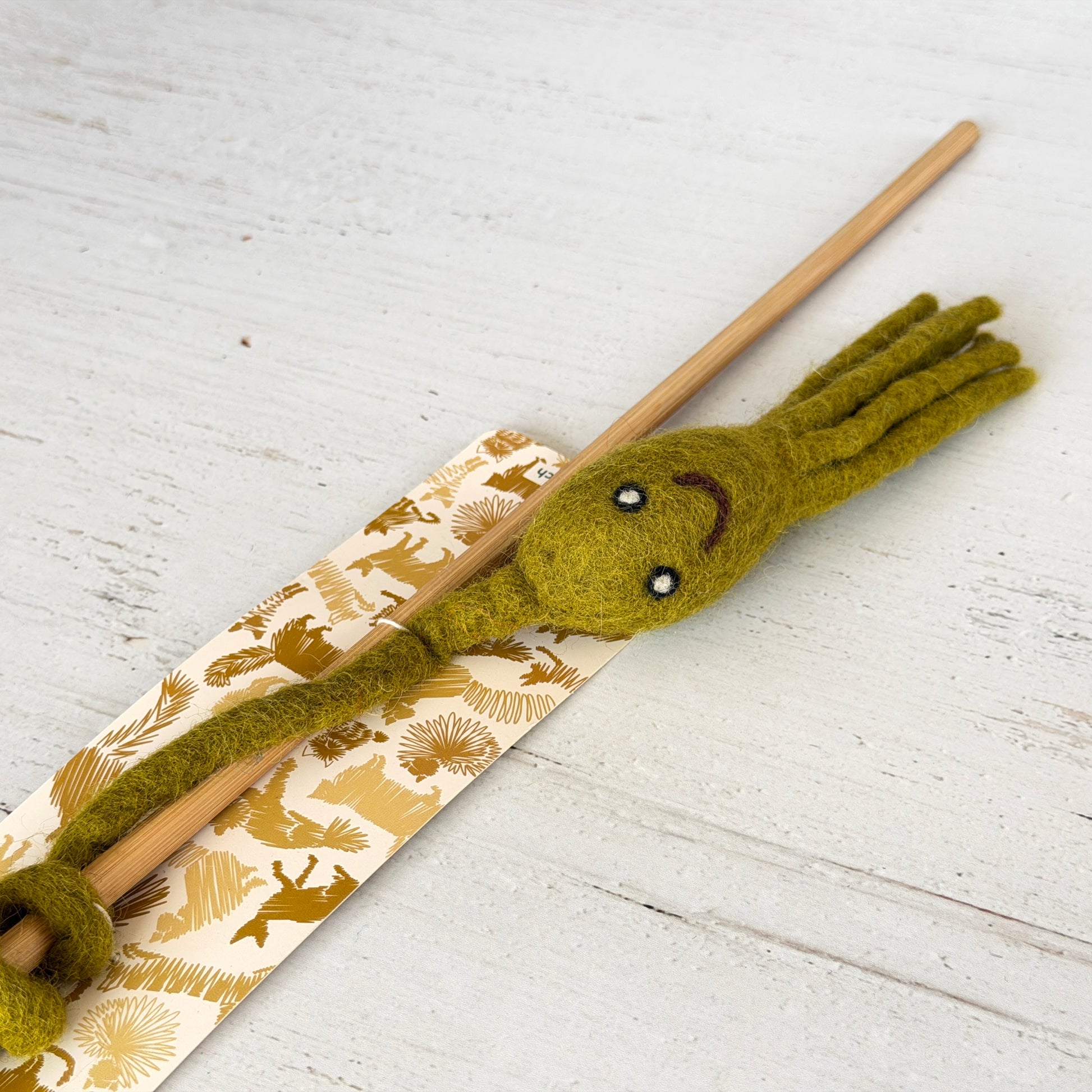 タコの頭が伸びて持ち手に結び付く一体型
